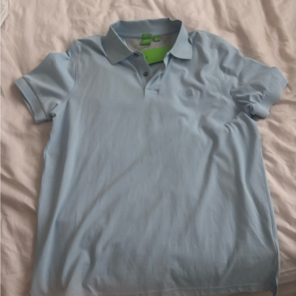 Men's XL shirt. Blue, in very good condition tag still on never worn